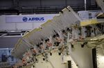 A section of a wing stands in a bay on the Airbus SE A350 wing production line at the Airbus SE assembly factory in Broughton, U.K.
