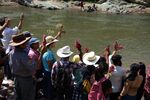 People honor the late environmentalist Berta Cáceres with a religious ceremony on the Gualcarque River in Honduras on March 27, 2016.