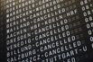 A flight information departure board displaying cancelled flights at Frankfurt Airport on April 13. 