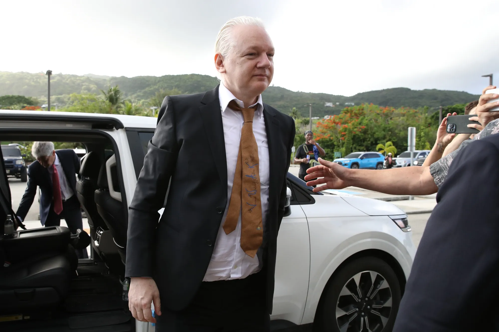 Julian Assange arrives at the United States Courthouse in Saipan, Northern Mariana Islands on June 26.