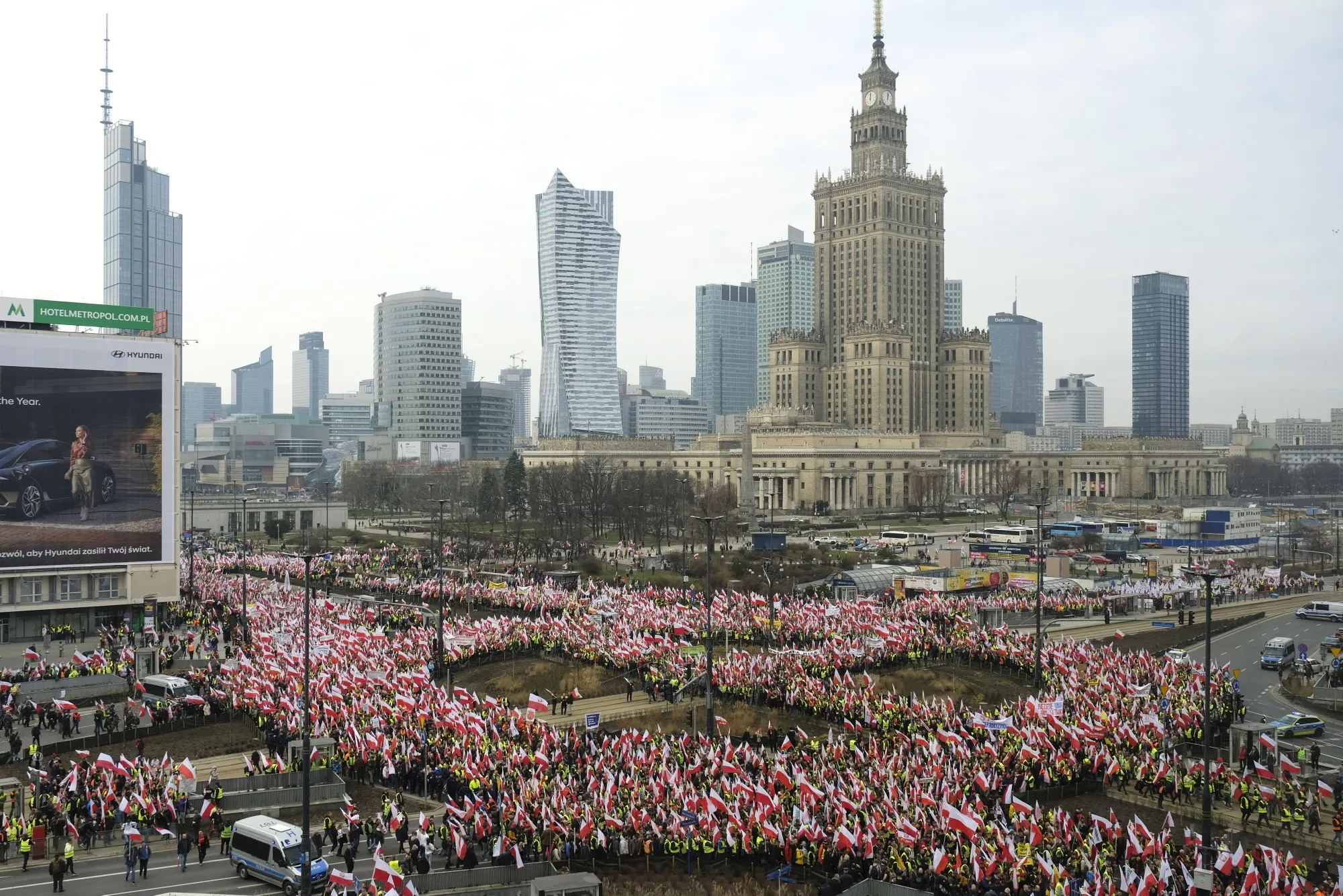 Polish farmers wave national flags during a protest against imports of Ukrainian grain in downtown Warsaw on Feb. 27.