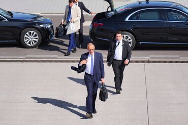 Friedrich Merz arrives to board his flight to to Paris and Warsaw, on May 7.