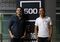 James Riney, head of 500 Startups Japan, (L) andYohei Sawayama, managing partner of 500 Startups Japan, pose for a photograph next to its company logo following an interview in Tokyo, Japan, on Tuesday, August 23, 2016. Photographer: Yuya Shino/Bloomberg