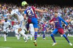 A Spanish League football match between FC Barcelona and Real Madrid CF at the Camp Nou stadium in Barcelona. 