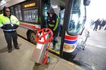 A farebox is pulled from&nbsp;a bus&nbsp;in Lawrence, Massachusetts in February 2022 as the&nbsp;Merrimack Valley Regional Transit Authority kicks off its fare-free bus service.