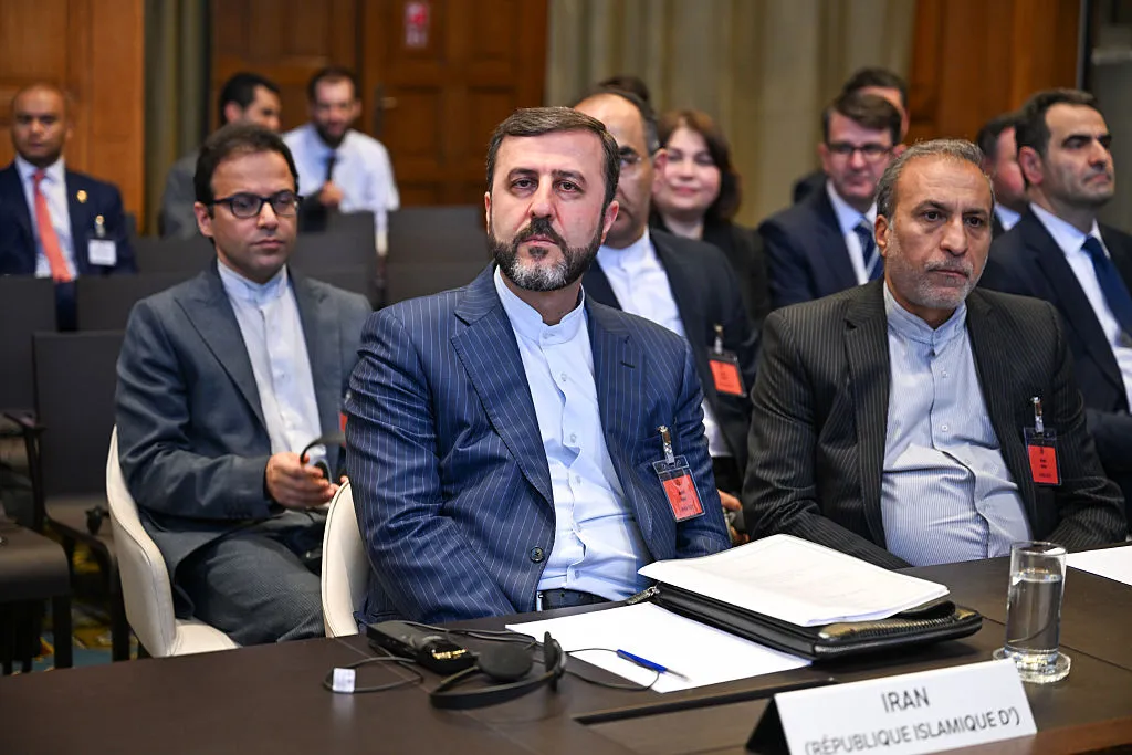 Deputy Foreign Minister for International Affairs Kazem Gharibabadi, center, at The Hague in April.&nbsp;