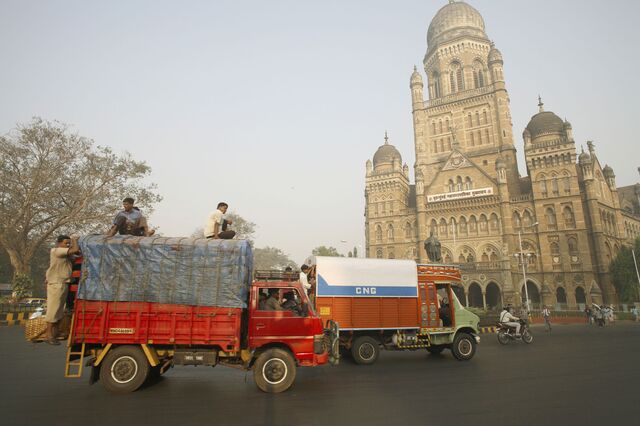 Traffic outside the Municipal Corporation Building in Mumbai, India in 2001.