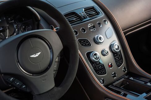 The interior of the DB9 GT is defined by fluted perforated leather seats and futuristic console design.