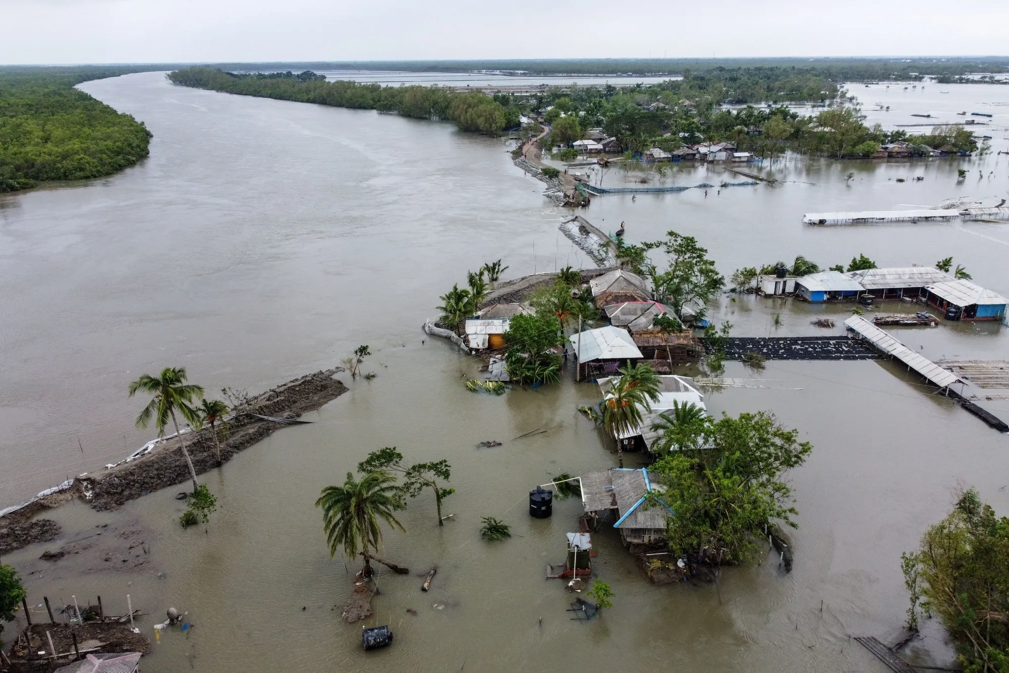 A village is flooded after a dam broke following cyclone Amphan's landfall in Shyamnagar, Bangladesh, on May 21.