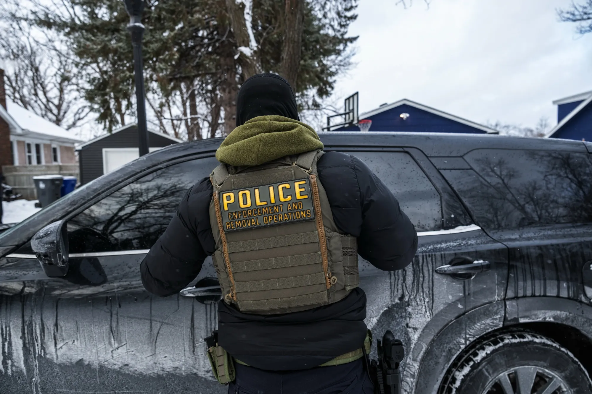 A federal law enforcement agents outside a private residence in St. Paul, Minnesota,&nbsp;on&nbsp;Jan. 18.