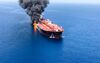 A picture obtained by AFP from Iranian News Agency ISNA on June 13, 2019 reportedly shows fire and smoke billowing from Norwegian owned Front Altair tanker said to have been attacked in the waters of the Gulf of Oman. - Suspected attacks left two tankers in flames in the waters of the Gulf of Oman today, sending world oil prices soaring as Iran helped rescue stricken crew members. The mystery incident, the second involving shipping in the strategic sea lane in only a few weeks, came amid spiralling tensions between Tehran and Washington, which has pointed the finger at Iran over earlier tanker attacks in May. (Photo by - / ISNA / AFP) (Photo credit should read -/AFP/Getty Images)