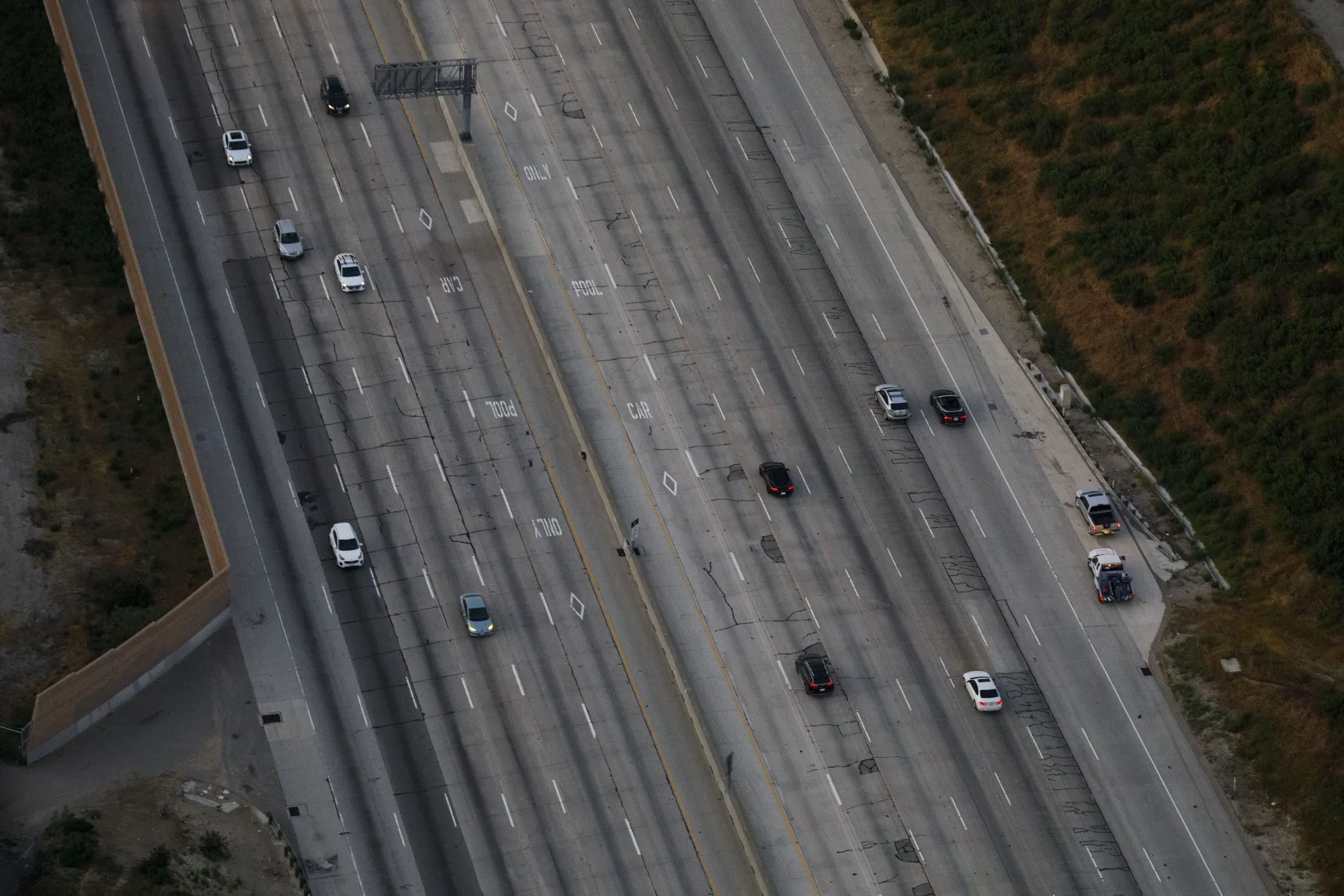Vehicles drive in light traffic along the 405 freeway, through the Sepulveda Pass, in Los Angeles on May 1.
