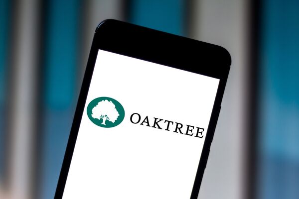 In this photo illustration the Oaktree Capital Management
