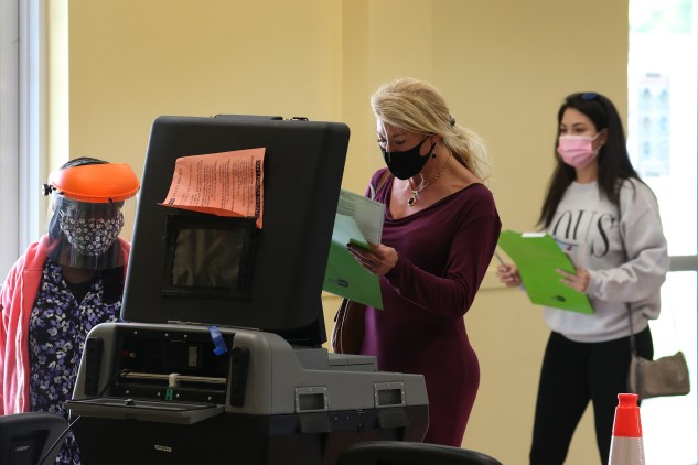A voter&nbsp;casts a ballot at the Legion Park polling place in Miami, Florida, on Nov. 3.