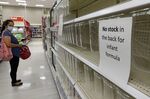 A sign on an empty shelf informs customers that there is no stock in the back for infant formula at a supermarket on May 23, 2022, in New York City. 
