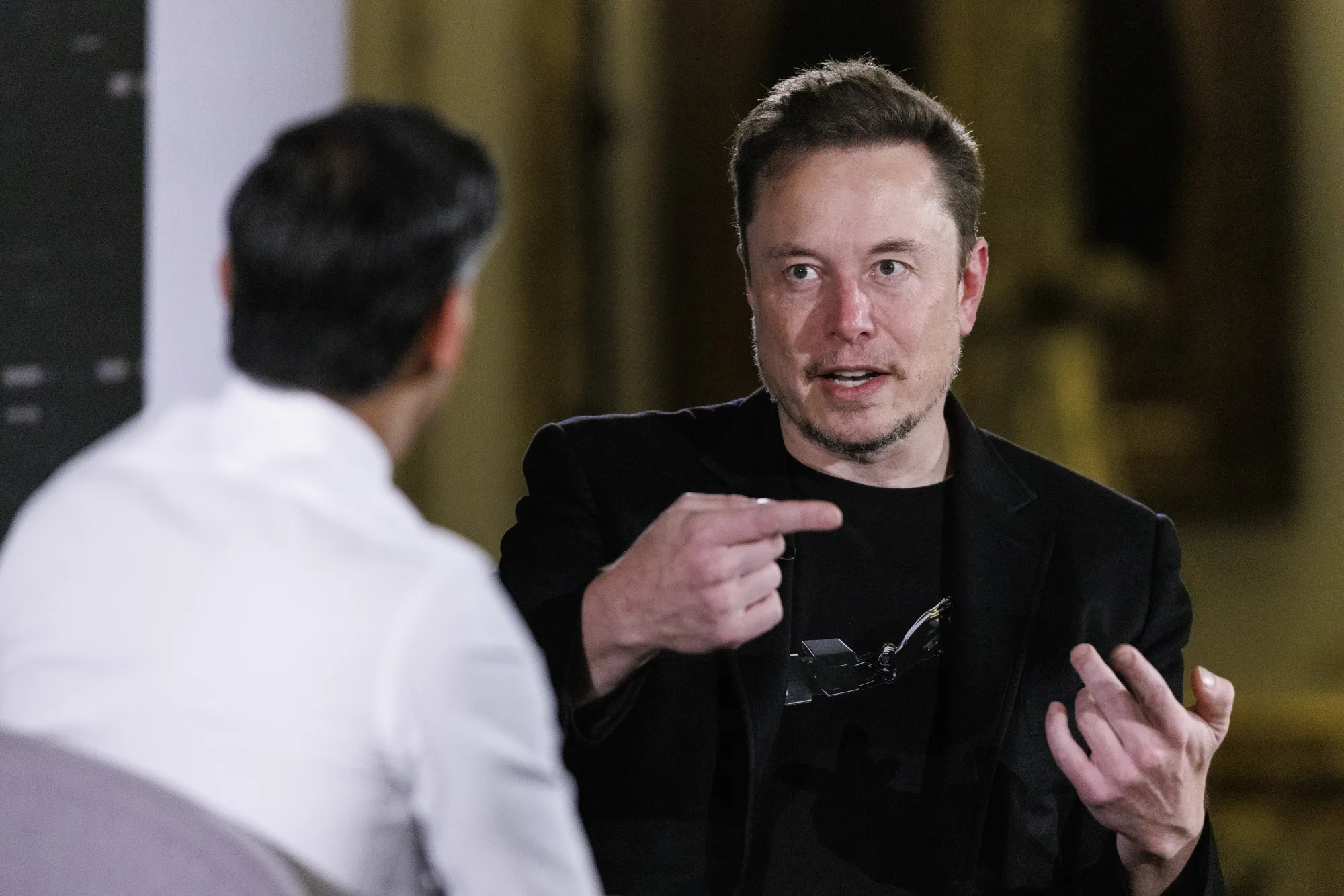 Elon Musk, right, and Rishi Sunak, UK prime minister, in a discussion on AI risks in London.