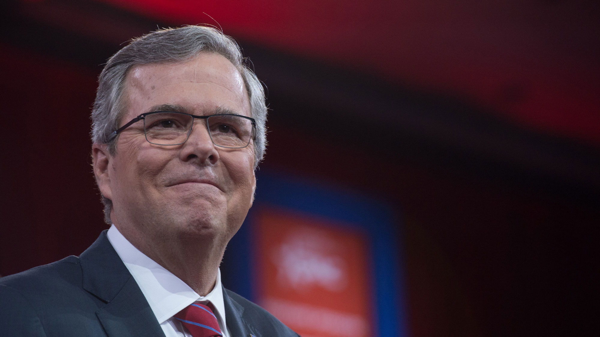 Former Florida Governor Jeb Bush speaks on stage with conservative political commentator Sean Hannity at the annual Conservative Political Action Conference (CPAC) at National Harbor, Maryland, outside Washington, on February 27, 2015.
