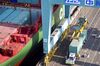A China Shipping container is off-loaded from a ship at the Port of Long Beach in Long Beach, California, U.S., on Tuesday, Nov. 11, 2008. The U.S. trade deficit in September narrowed more than forecast as a record decline in the cost of foreign crude oil caused fuel imports to tumble.