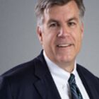 Headshot of David D Cooke