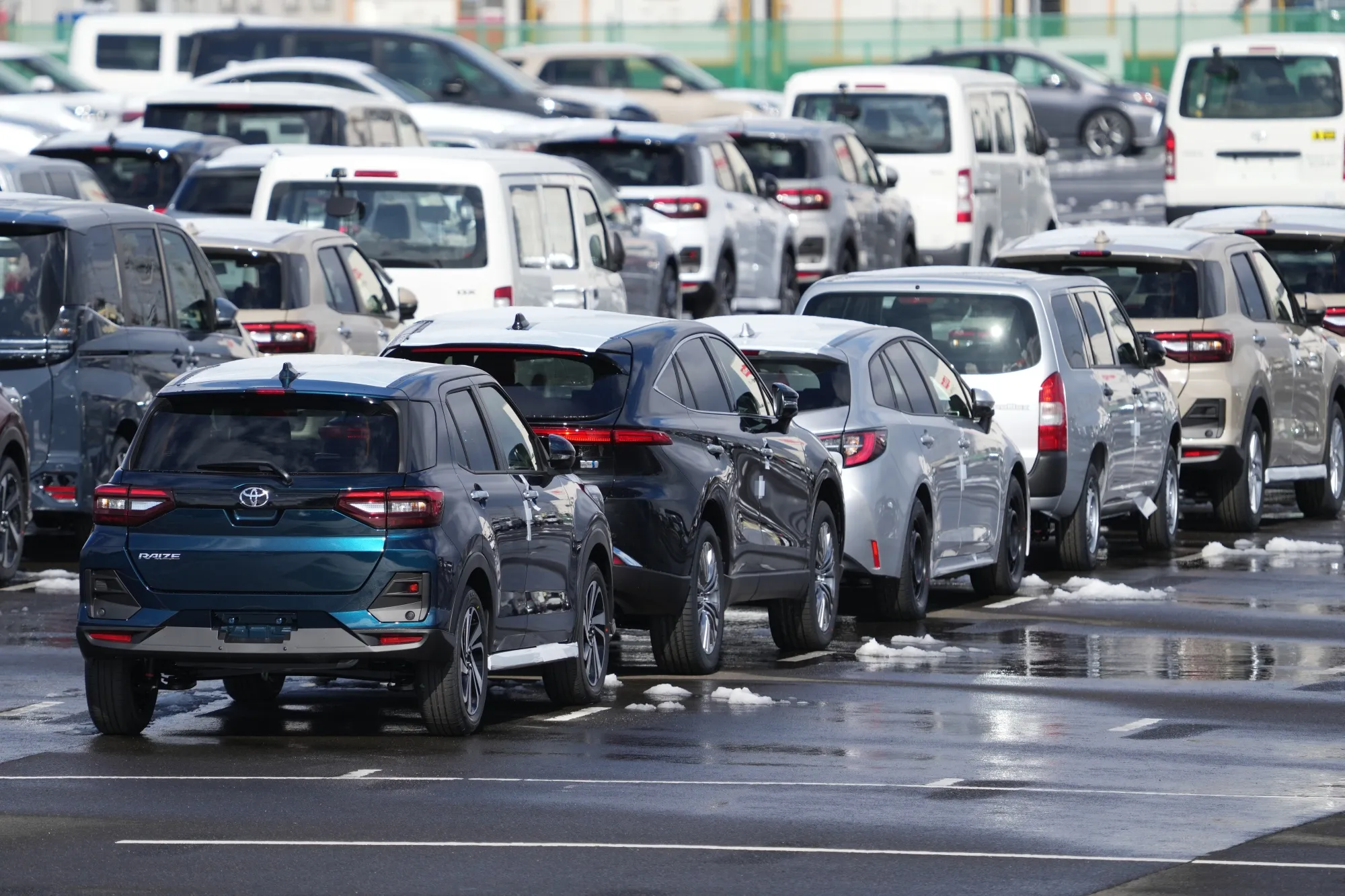 Toyota vehicles awaiting shipment in Miyagi Prefecture, Japan.&nbsp;The world’s biggest carmaker trimmed its sales forecast because of production halts.&nbsp;