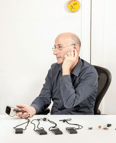 An iOS-compatible directional microphone helps users pick up words from a particular part of a room. Companion mics, slung around friends’ necks, can focus audio from individual people. A mix of in-ear devices lets Einhorn tweak his hearing for different situations.