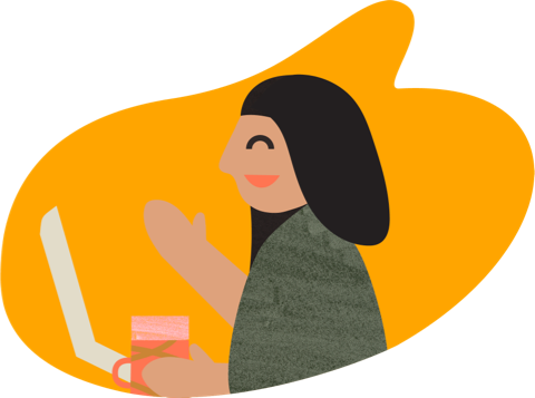 Woman drinking coffee while at computer